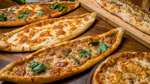 Assorted Turkish foodset.  pide with meat , pide with cheese, pide mix, lachmajun